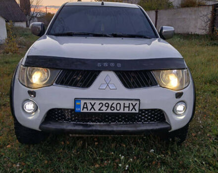 Білий Міцубісі Л 200, об'ємом двигуна 2.48 л та пробігом 360 тис. км за 11300 $, фото 1 на Automoto.ua