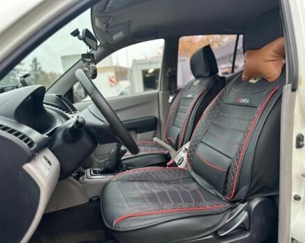 Белый Мицубиси Л 200, объемом двигателя 2.5 л и пробегом 234 тыс. км за 2705 $, фото 4 на Automoto.ua