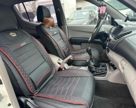 Белый Мицубиси Л 200, объемом двигателя 2.5 л и пробегом 234 тыс. км за 2705 $, фото 5 на Automoto.ua