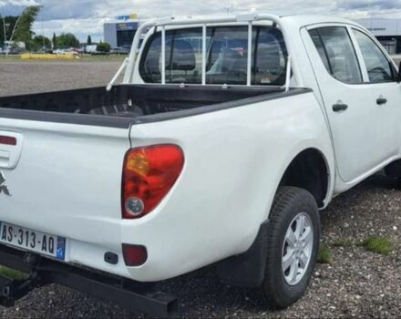 Білий Міцубісі Л 200, об'ємом двигуна 2.5 л та пробігом 115 тис. км за 6380 $, фото 3 на Automoto.ua