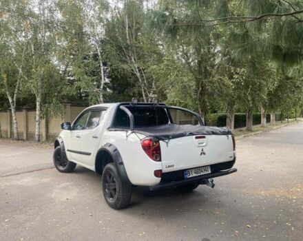 Белый Мицубиси Л 200, объемом двигателя 2.5 л и пробегом 169 тыс. км за 17000 $, фото 3 на Automoto.ua