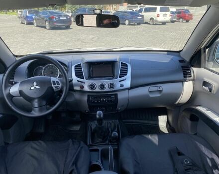 Белый Мицубиси Л 200, объемом двигателя 2.5 л и пробегом 169 тыс. км за 17000 $, фото 8 на Automoto.ua