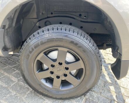 Белый Мицубиси Л 200, объемом двигателя 2.5 л и пробегом 169 тыс. км за 17000 $, фото 7 на Automoto.ua