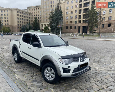 Белый Мицубиси Л 200, объемом двигателя 2.48 л и пробегом 286 тыс. км за 15500 $, фото 12 на Automoto.ua