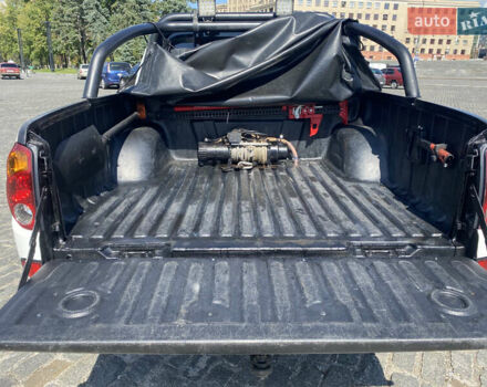 Белый Мицубиси Л 200, объемом двигателя 2.48 л и пробегом 169 тыс. км за 15000 $, фото 11 на Automoto.ua