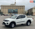 Белый Мицубиси Л 200, объемом двигателя 2.48 л и пробегом 286 тыс. км за 15500 $, фото 1 на Automoto.ua