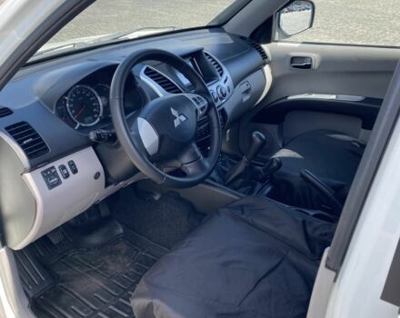 Белый Мицубиси Л 200, объемом двигателя 2.5 л и пробегом 169 тыс. км за 17000 $, фото 10 на Automoto.ua