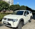 Белый Мицубиси Л 200, объемом двигателя 2.48 л и пробегом 121 тыс. км за 23000 $, фото 1 на Automoto.ua