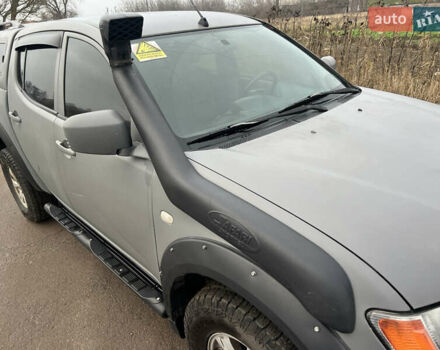 Білий Міцубісі Л 200, об'ємом двигуна 2.48 л та пробігом 324 тис. км за 13000 $, фото 10 на Automoto.ua