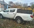 Белый Мицубиси Л 200, объемом двигателя 2.5 л и пробегом 134 тыс. км за 7200 $, фото 2 на Automoto.ua