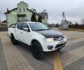 Белый Мицубиси Л 200, объемом двигателя 2.5 л и пробегом 114 тыс. км за 8510 $, фото 1 на Automoto.ua