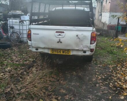 Белый Мицубиси Л 200, объемом двигателя 2.5 л и пробегом 134 тыс. км за 7200 $, фото 1 на Automoto.ua