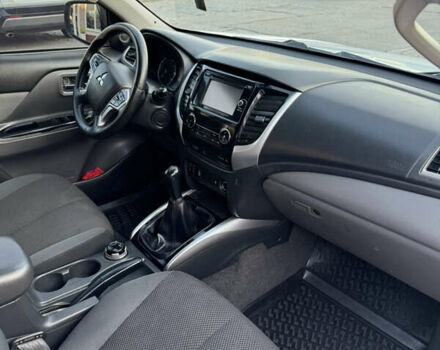 Білий Міцубісі Л 200, об'ємом двигуна 2.44 л та пробігом 226 тис. км за 22000 $, фото 14 на Automoto.ua