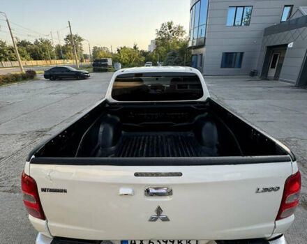 Білий Міцубісі Л 200, об'ємом двигуна 2.44 л та пробігом 226 тис. км за 22000 $, фото 7 на Automoto.ua