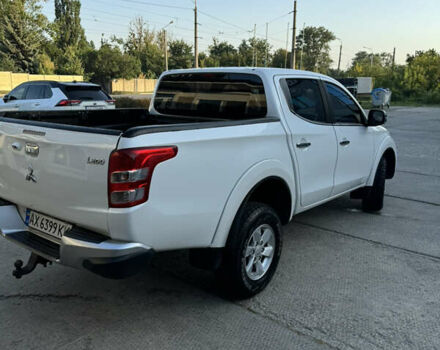 Білий Міцубісі Л 200, об'ємом двигуна 2.44 л та пробігом 226 тис. км за 22000 $, фото 4 на Automoto.ua