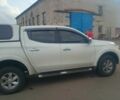 Белый Мицубиси Л 200, объемом двигателя 2.4 л и пробегом 335 тыс. км за 12000 $, фото 1 на Automoto.ua