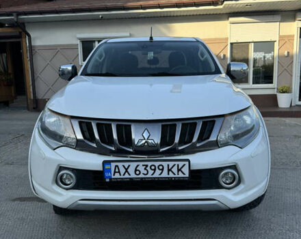 Білий Міцубісі Л 200, об'ємом двигуна 2.44 л та пробігом 226 тис. км за 22000 $, фото 1 на Automoto.ua