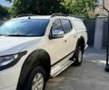 Белый Мицубиси Л 200, объемом двигателя 2.48 л и пробегом 138 тыс. км за 24500 $, фото 1 на Automoto.ua