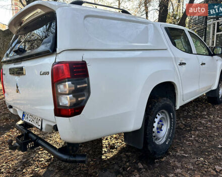 Белый Мицубиси Л 200, объемом двигателя 2.44 л и пробегом 312 тыс. км за 25000 $, фото 4 на Automoto.ua