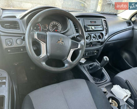 Белый Мицубиси Л 200, объемом двигателя 2.44 л и пробегом 312 тыс. км за 25000 $, фото 9 на Automoto.ua