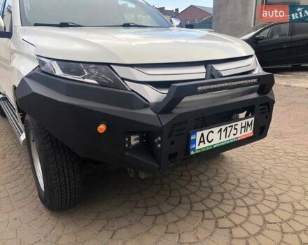 Білий Міцубісі Л 200, об'ємом двигуна 2.3 л та пробігом 152 тис. км за 22000 $, фото 38 на Automoto.ua
