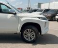 Білий Міцубісі Л 200, об'ємом двигуна 2.4 л та пробігом 195 тис. км за 24890 $, фото 10 на Automoto.ua