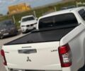 Білий Міцубісі Л 200, об'ємом двигуна 2.4 л та пробігом 195 тис. км за 24890 $, фото 7 на Automoto.ua