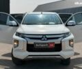 Білий Міцубісі Л 200, об'ємом двигуна 2.4 л та пробігом 195 тис. км за 24890 $, фото 13 на Automoto.ua