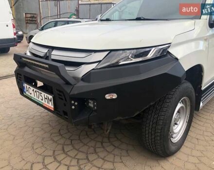 Білий Міцубісі Л 200, об'ємом двигуна 2.3 л та пробігом 152 тис. км за 22000 $, фото 33 на Automoto.ua