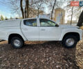 Белый Мицубиси Л 200, объемом двигателя 2.44 л и пробегом 312 тыс. км за 25000 $, фото 3 на Automoto.ua