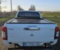 Белый Мицубиси Л 200, объемом двигателя 2.44 л и пробегом 195 тыс. км за 21800 $, фото 4 на Automoto.ua