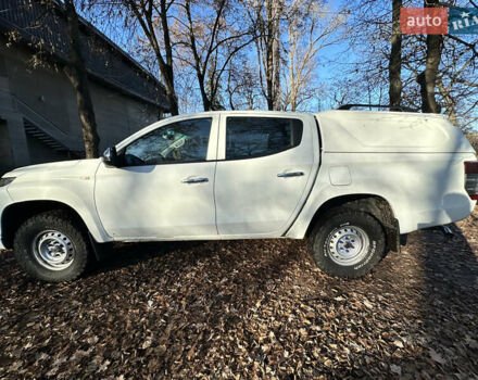 Белый Мицубиси Л 200, объемом двигателя 2.44 л и пробегом 312 тыс. км за 25000 $, фото 7 на Automoto.ua