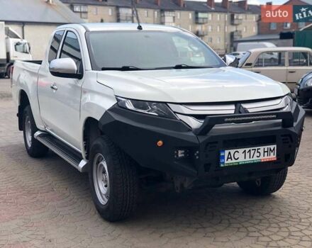 Білий Міцубісі Л 200, об'ємом двигуна 2.3 л та пробігом 152 тис. км за 22000 $, фото 2 на Automoto.ua