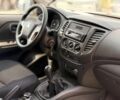 Білий Міцубісі Л 200, об'ємом двигуна 2.4 л та пробігом 195 тис. км за 24890 $, фото 11 на Automoto.ua