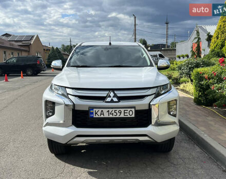 Білий Міцубісі Л 200, об'ємом двигуна 2.44 л та пробігом 90 тис. км за 27400 $, фото 8 на Automoto.ua