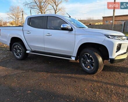 Білий Міцубісі Л 200, об'ємом двигуна 2.44 л та пробігом 56 тис. км за 28800 $, фото 11 на Automoto.ua