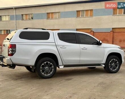 Белый Мицубиси Л 200, объемом двигателя 2.44 л и пробегом 60 тыс. км за 28500 $, фото 7 на Automoto.ua