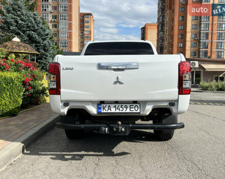 Білий Міцубісі Л 200, об'ємом двигуна 2.44 л та пробігом 90 тис. км за 27400 $, фото 7 на Automoto.ua