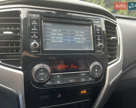 Білий Міцубісі Л 200, об'ємом двигуна 2.44 л та пробігом 90 тис. км за 27400 $, фото 18 на Automoto.ua