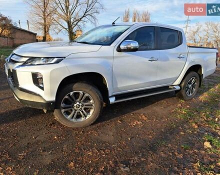 Білий Міцубісі Л 200, об'ємом двигуна 2.44 л та пробігом 56 тис. км за 28800 $, фото 2 на Automoto.ua