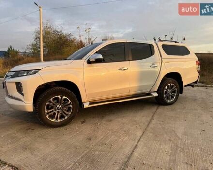 Белый Мицубиси Л 200, объемом двигателя 2.44 л и пробегом 60 тыс. км за 28500 $, фото 11 на Automoto.ua