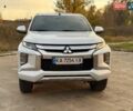 Белый Мицубиси Л 200, объемом двигателя 2.44 л и пробегом 60 тыс. км за 28500 $, фото 2 на Automoto.ua