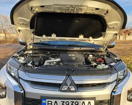 Білий Міцубісі Л 200, об'ємом двигуна 2.44 л та пробігом 56 тис. км за 28800 $, фото 5 на Automoto.ua