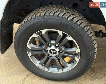 Белый Мицубиси Л 200, объемом двигателя 2.44 л и пробегом 60 тыс. км за 28500 $, фото 27 на Automoto.ua