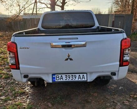 Білий Міцубісі Л 200, об'ємом двигуна 2.44 л та пробігом 56 тис. км за 28800 $, фото 3 на Automoto.ua