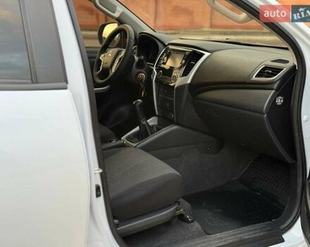 Белый Мицубиси Л 200, объемом двигателя 2.44 л и пробегом 60 тыс. км за 28500 $, фото 18 на Automoto.ua