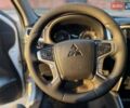 Белый Мицубиси Л 200, объемом двигателя 2.44 л и пробегом 60 тыс. км за 28500 $, фото 30 на Automoto.ua