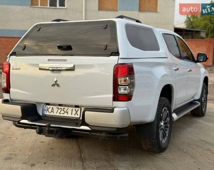 Белый Мицубиси Л 200, объемом двигателя 2.44 л и пробегом 60 тыс. км за 28500 $, фото 13 на Automoto.ua