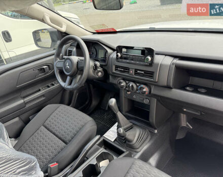 Белый Мицубиси Л 200, объемом двигателя 2.5 л и пробегом 1 тыс. км за 28962 $, фото 3 на Automoto.ua