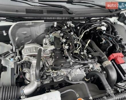 Белый Мицубиси Л 200, объемом двигателя 2.5 л и пробегом 1 тыс. км за 28962 $, фото 6 на Automoto.ua